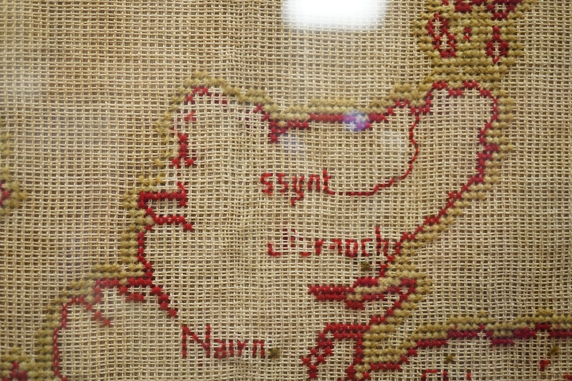 A 19th century red and green cross stitch sampler of The British Isles, by Mary Tyler aged 12 years. 65cm high x 52cm wide